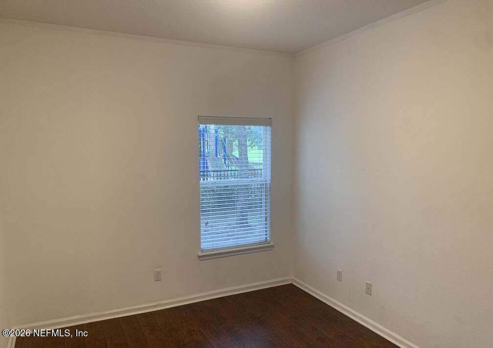 3631 Kirkpatrick Circle, Unit 6 Jacksonville, FL 32210 - Photo 10 of 14 an empty room with a window