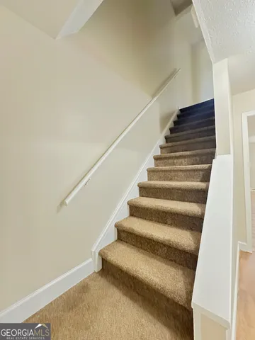 an empty room with closet area