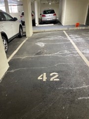 a building with car parked