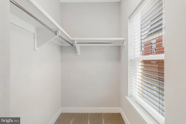 a view of a room with a window