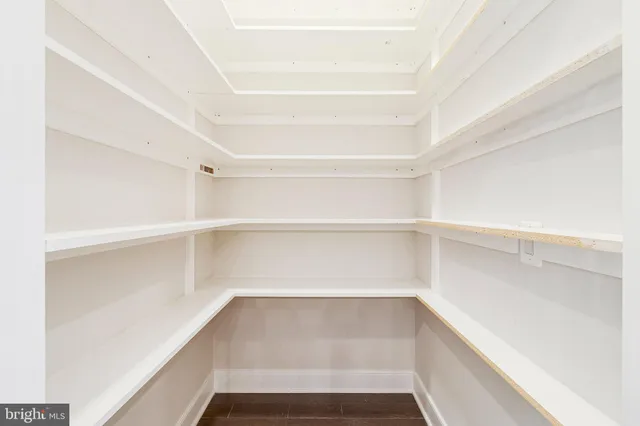 a front view of a building with many windows