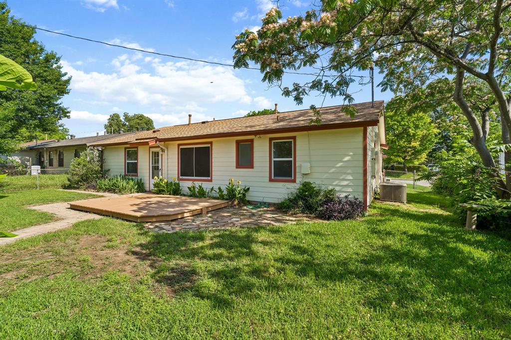 1822 Finley Road Irving, TX 75062 - Photo 34 of 38 a view of backyard of house with green space