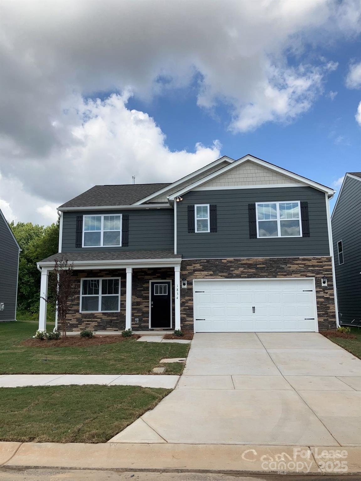 1834 Vanderlyn Street Monroe, NC 28112 - Photo 1 of 18 a front view of a house with a yard