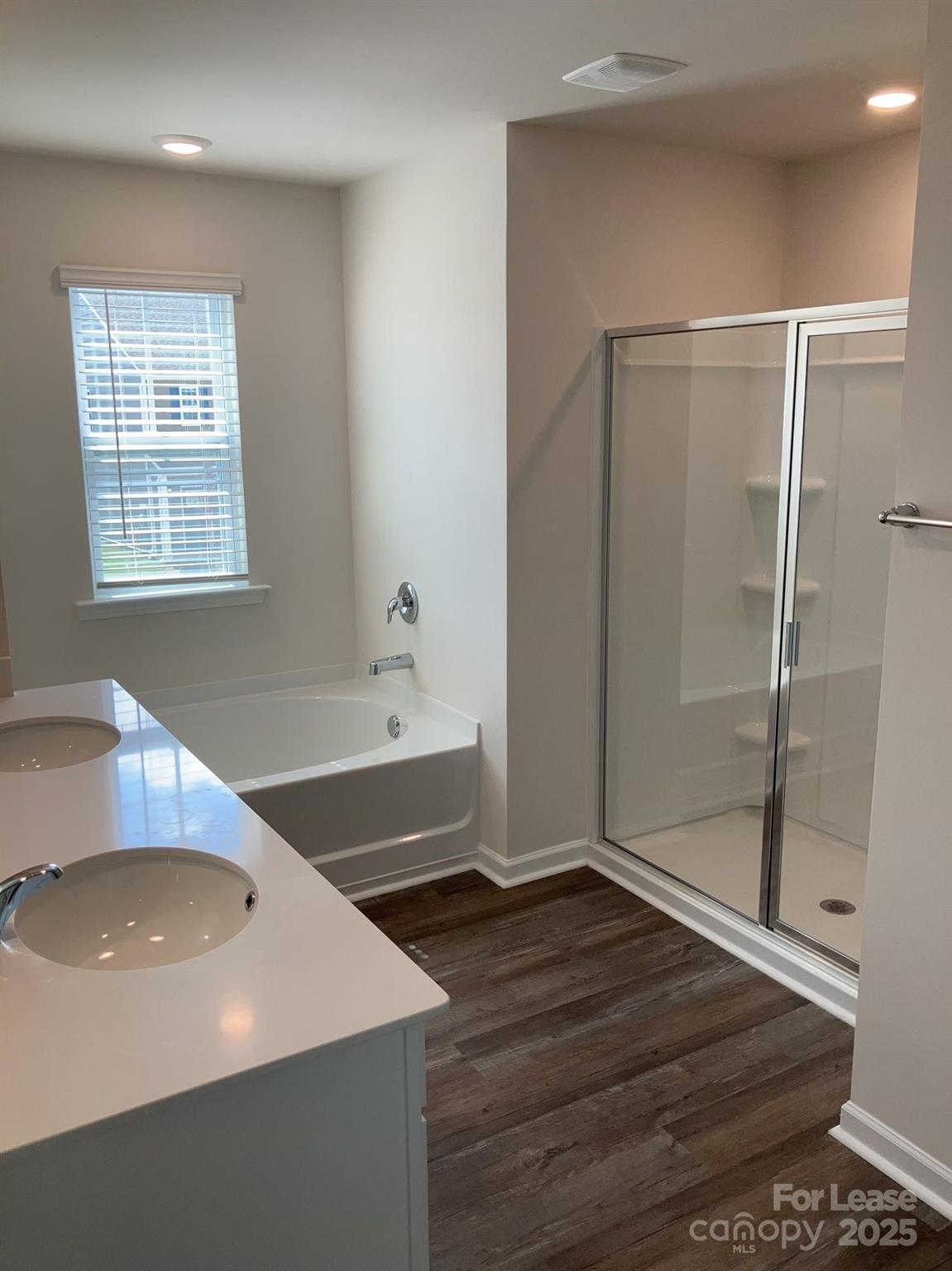 1834 Vanderlyn Street Monroe, NC 28112 - Photo 11 of 18 a view of a bathroom with a sink and a tub