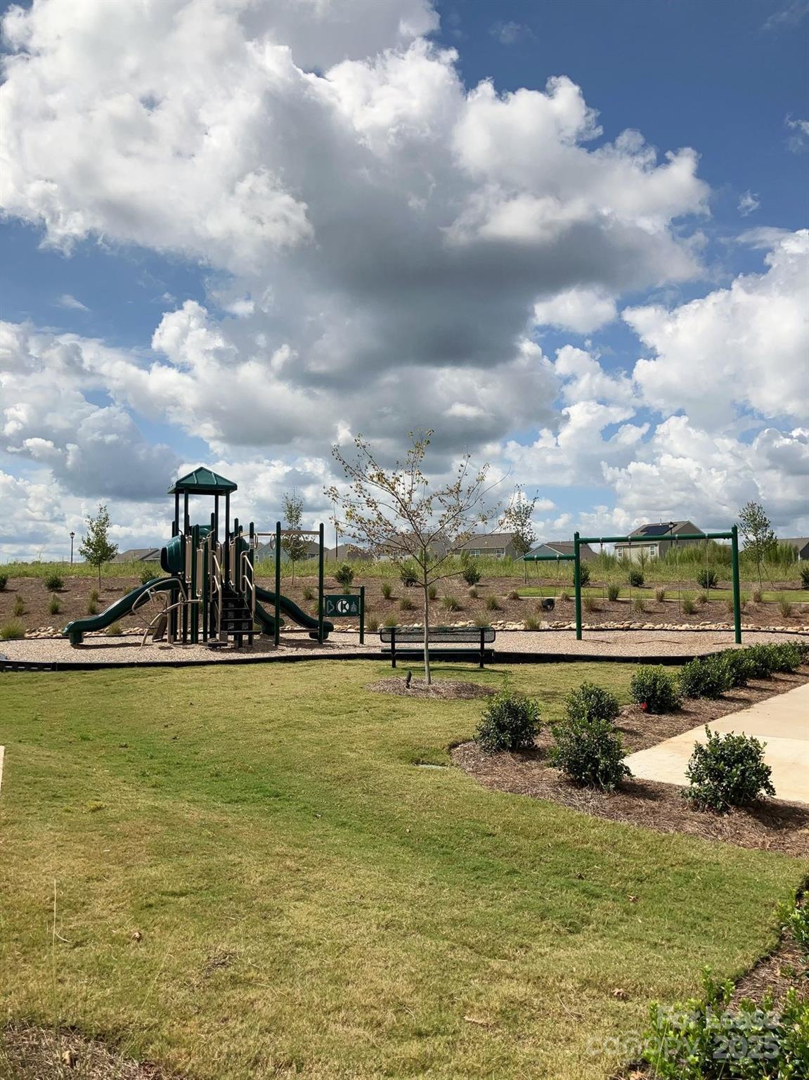 1834 Vanderlyn Street Monroe, NC 28112 - Photo 18 of 18 a view of a lake with houses in the back