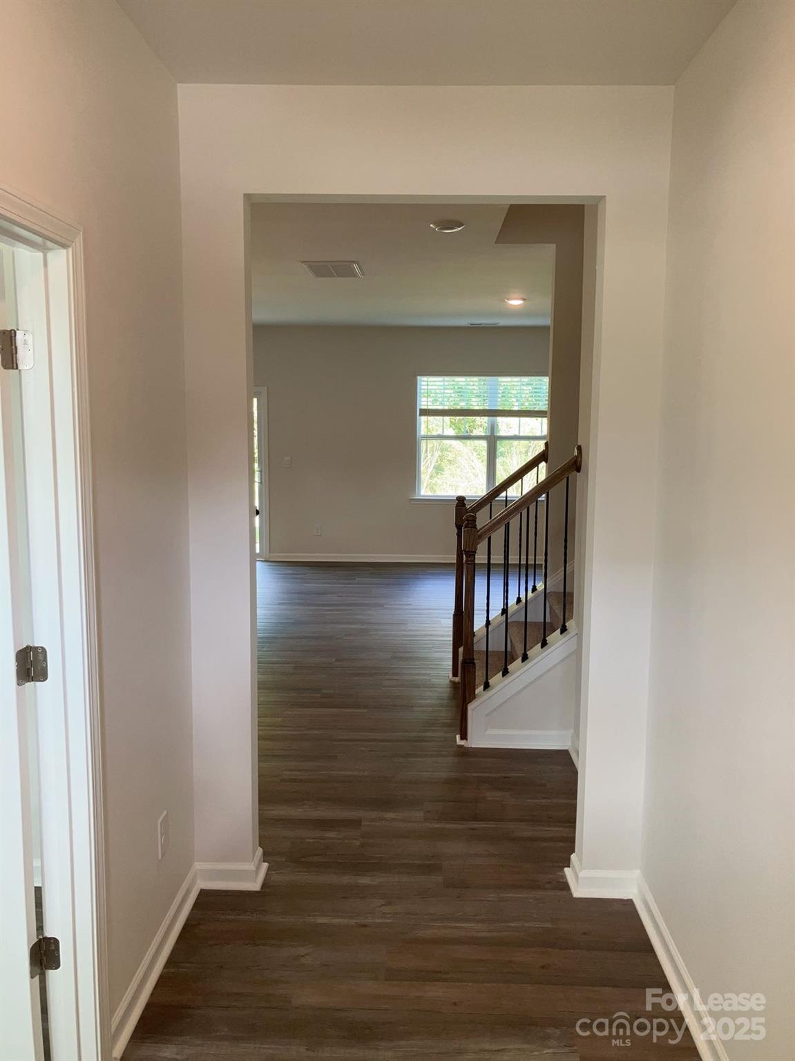 1834 Vanderlyn Street Monroe, NC 28112 - Photo 2 of 18 a view of entryway with wooden floor