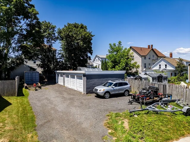 a car parked in front of a house