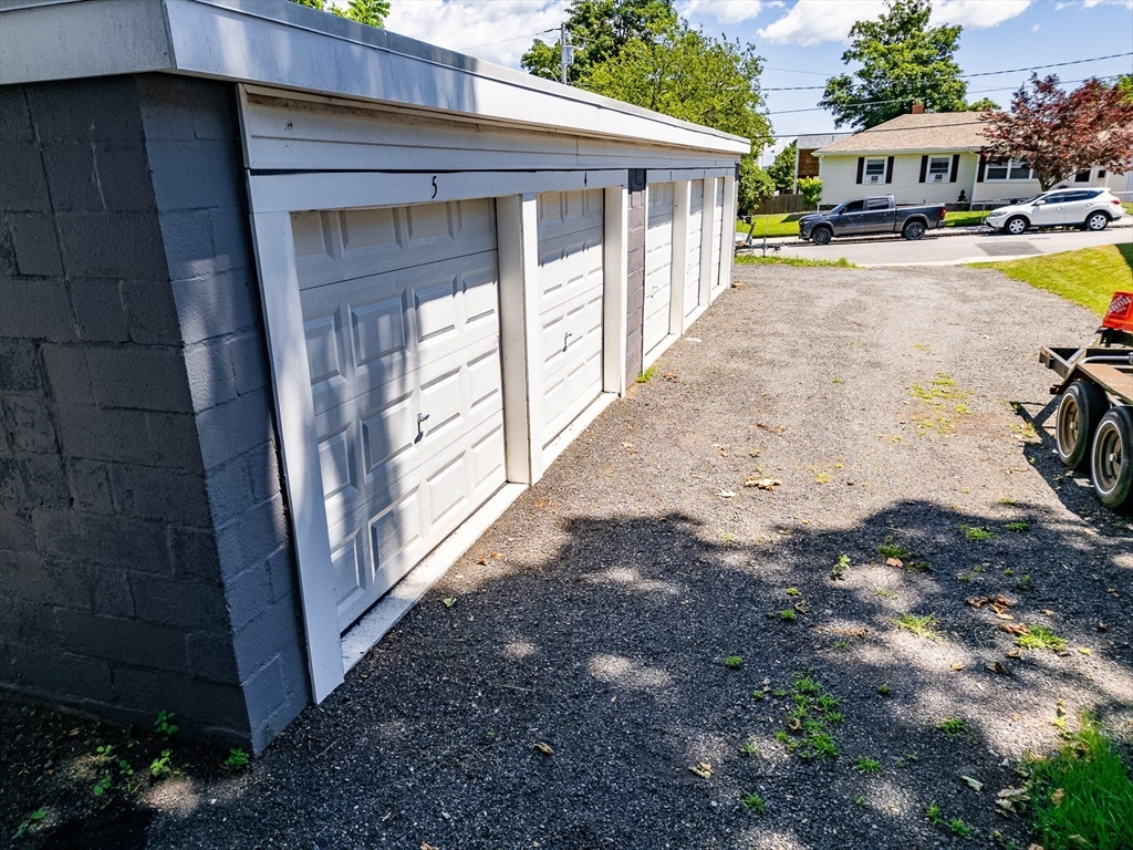311 South Oxford Street Fall River, MA 02721 - Photo 3 of 11 a view of swimming pool in front of residential houses with outdoor space