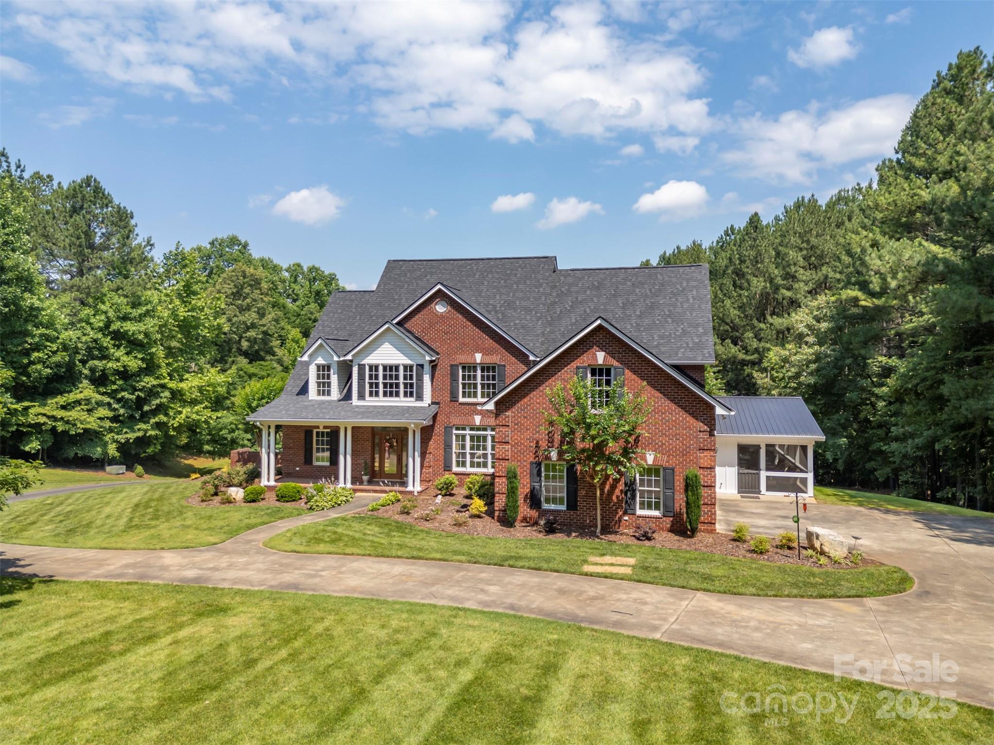 147 Pumkin Patch Road Rutherfordton, NC 28139 - Photo 1 of 47 a front view of a house with a yard