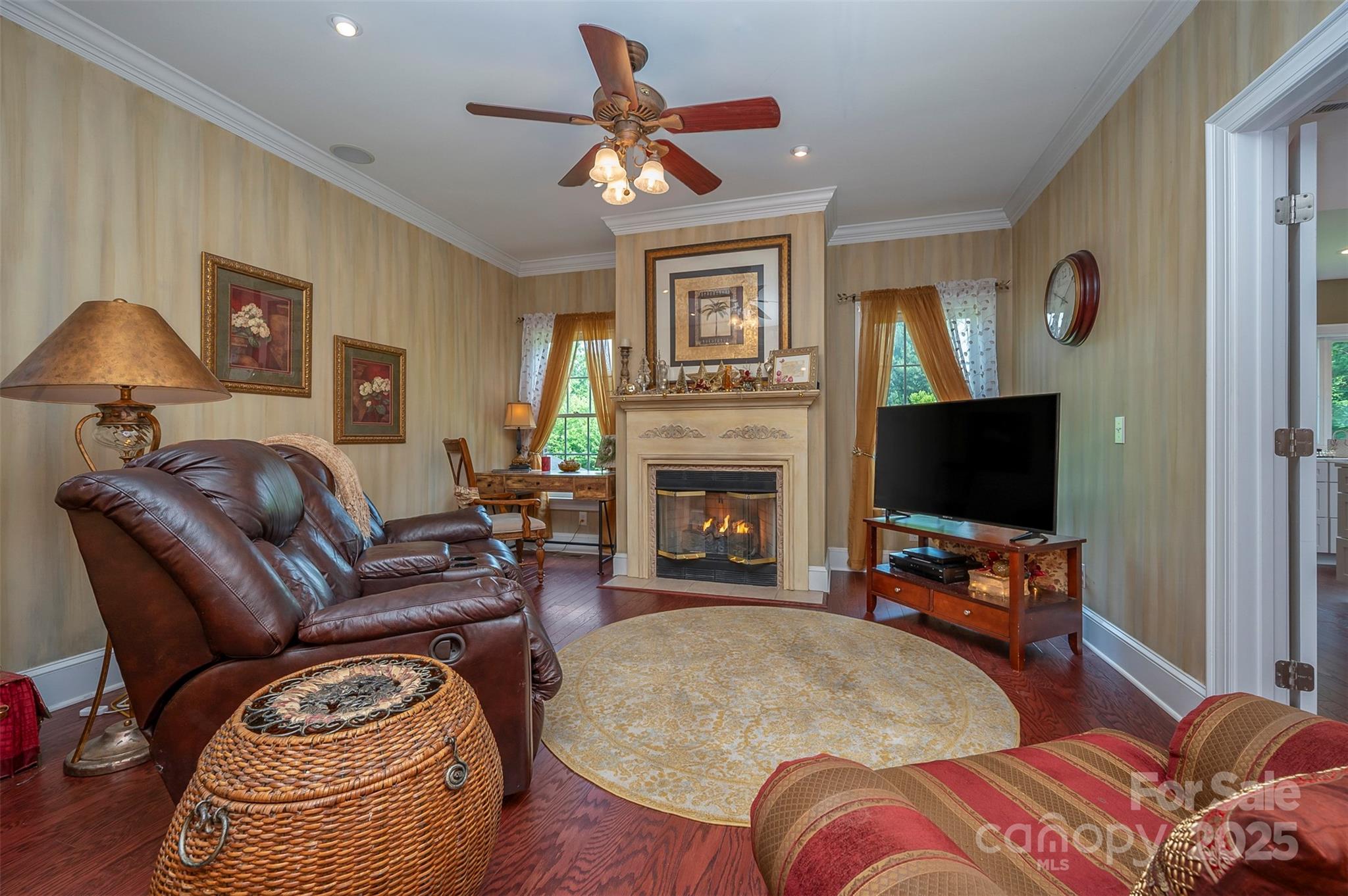 147 Pumkin Patch Road Rutherfordton, NC 28139 - Photo 11 of 47 a living room with furniture a flat screen tv and a fireplace