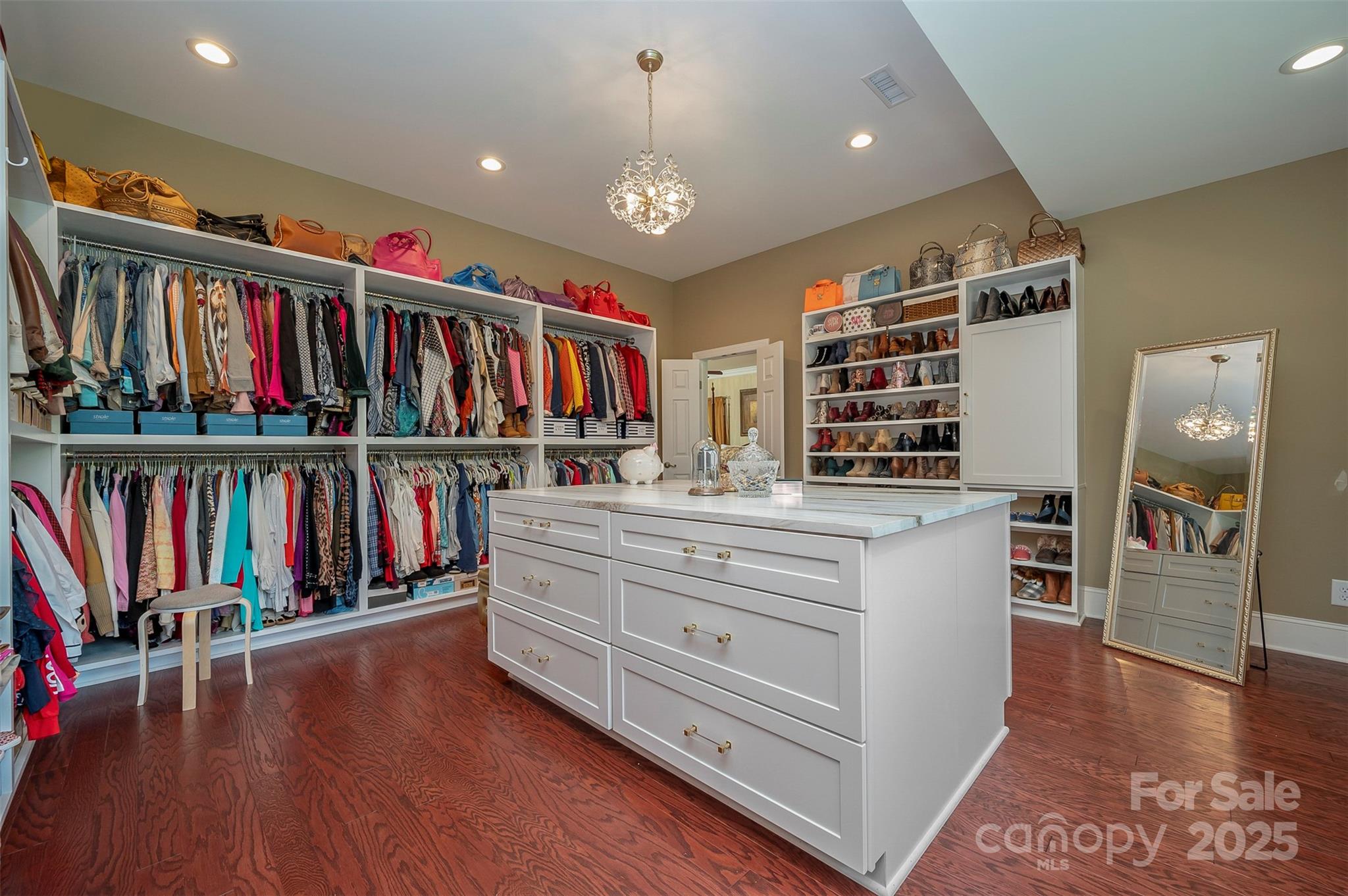 147 Pumkin Patch Road Rutherfordton, NC 28139 - Photo 16 of 47 a view of walk in closet with clothes shoes and a large window