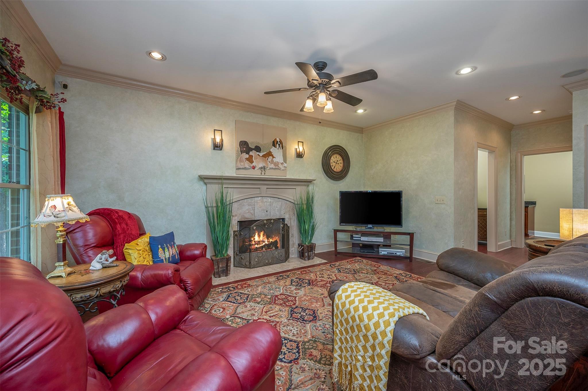 147 Pumkin Patch Road Rutherfordton, NC 28139 - Photo 20 of 47 a living room with furniture a fireplace and a flat screen tv