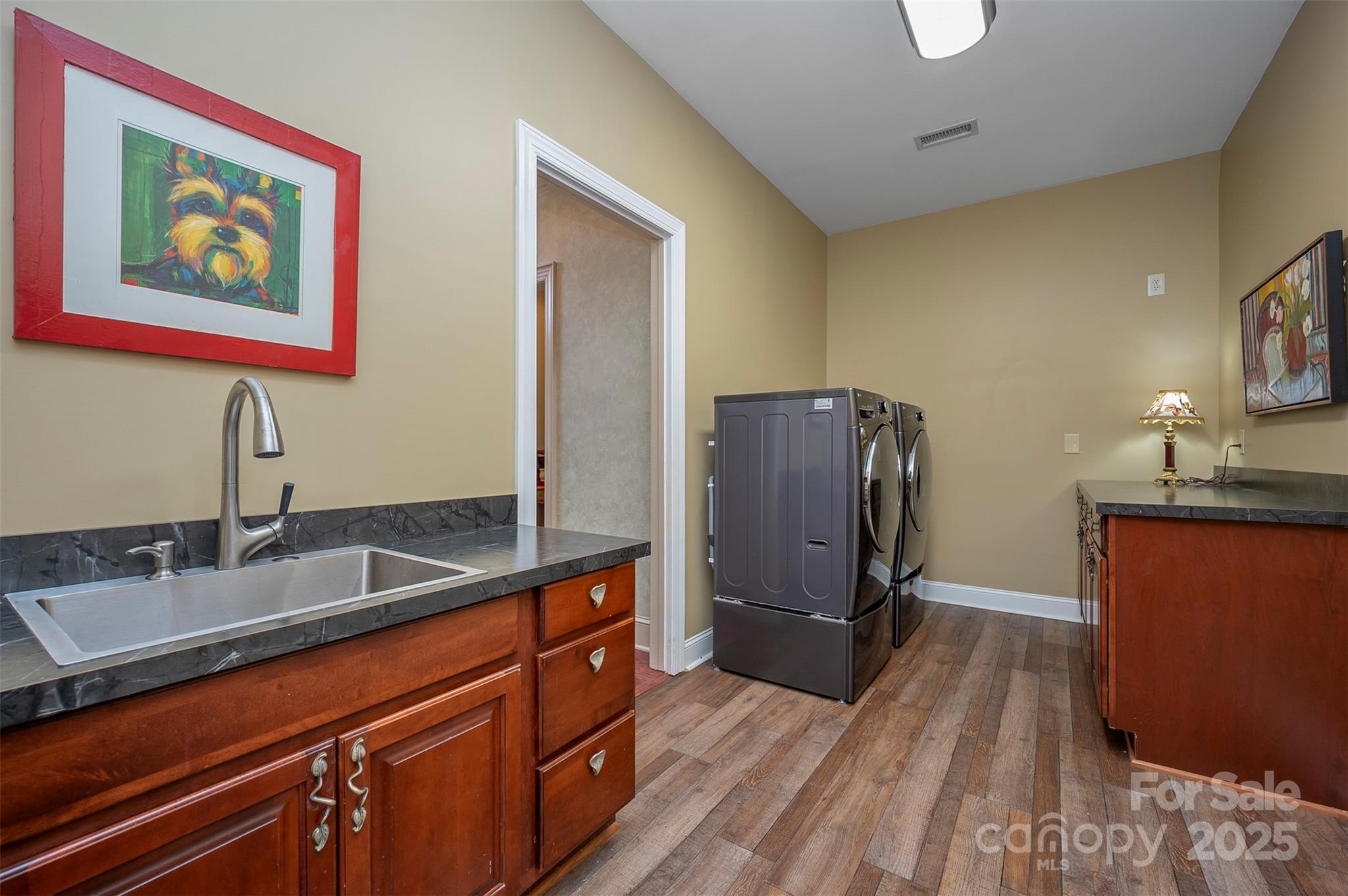147 Pumkin Patch Road Rutherfordton, NC 28139 - Photo 21 of 47 a kitchen with stainless steel appliances granite countertop a refrigerator and a sink