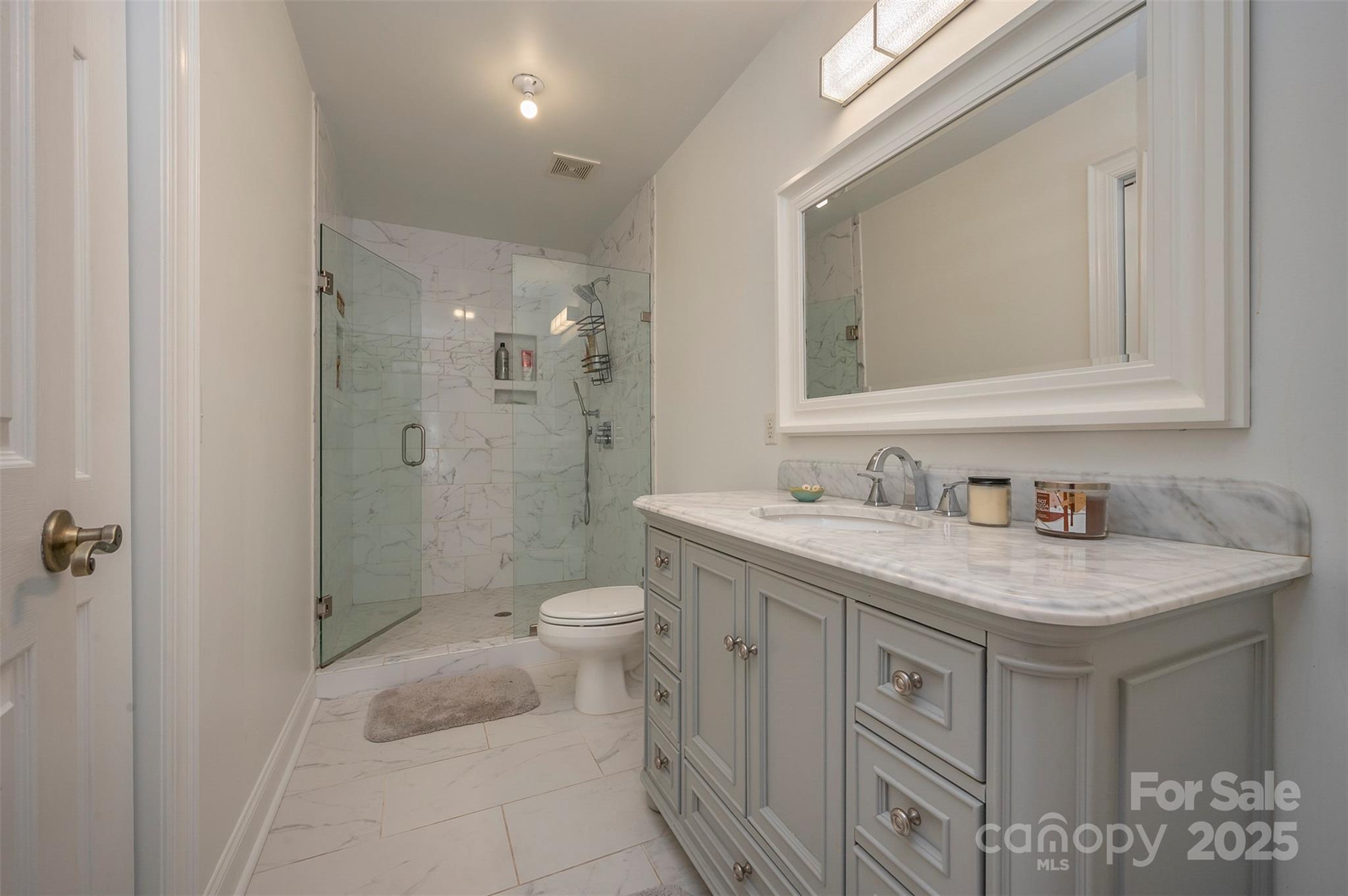 147 Pumkin Patch Road Rutherfordton, NC 28139 - Photo 31 of 47 a bathroom with a sink a toilet and shower