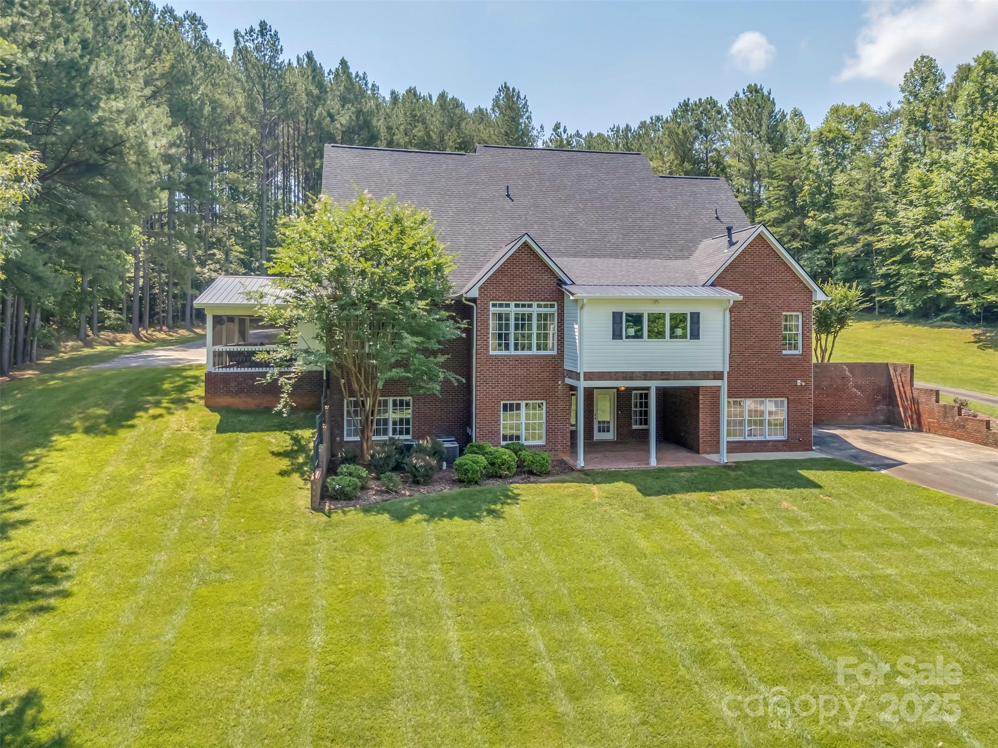 147 Pumkin Patch Road Rutherfordton, NC 28139 - Photo 40 of 47 a front view of house with yard and trees in the background