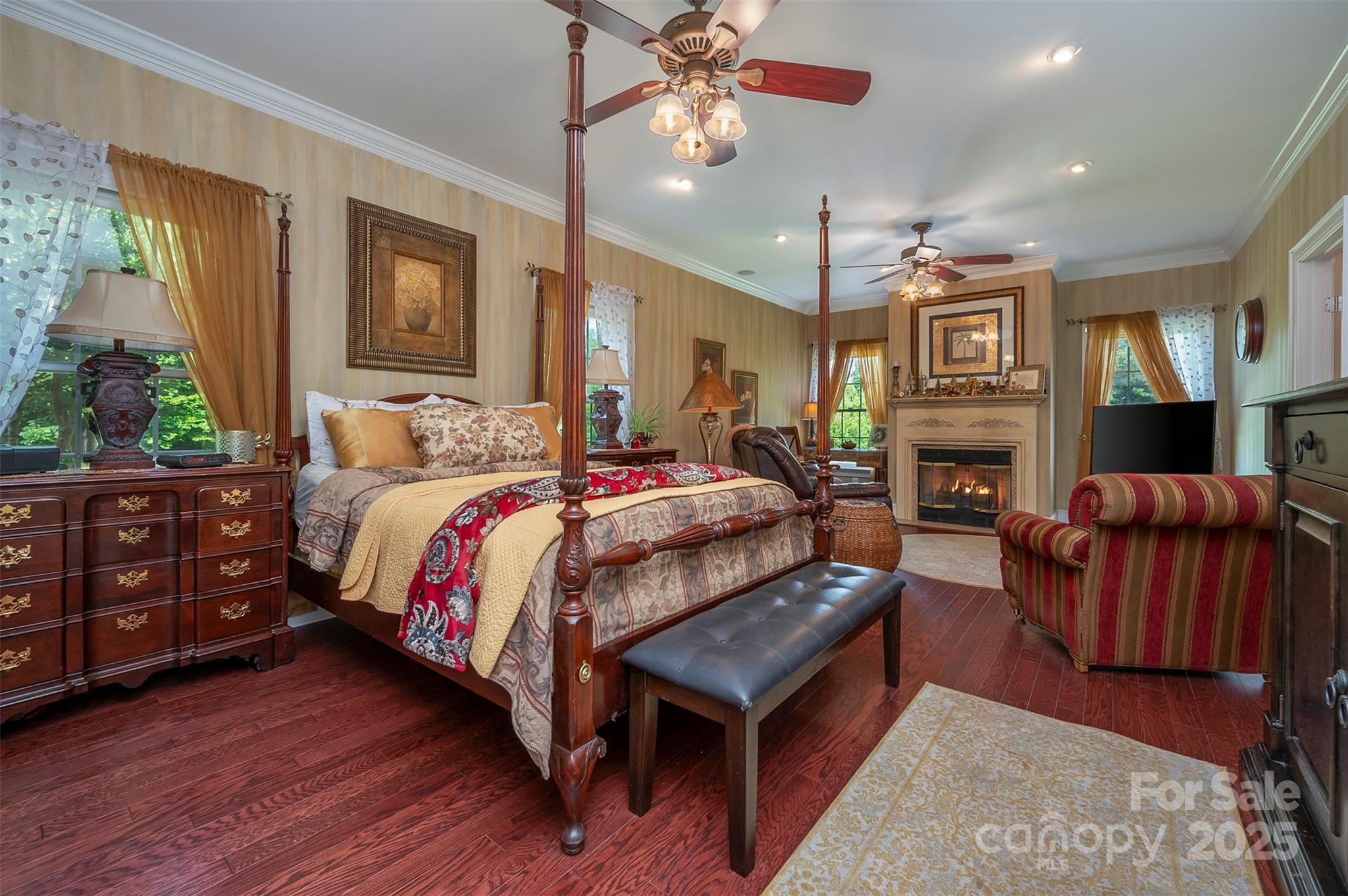147 Pumkin Patch Road Rutherfordton, NC 28139 - Photo 10 of 47 a bedroom with a bed dresser and a fireplace