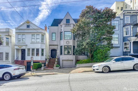 a car parked in front of a house