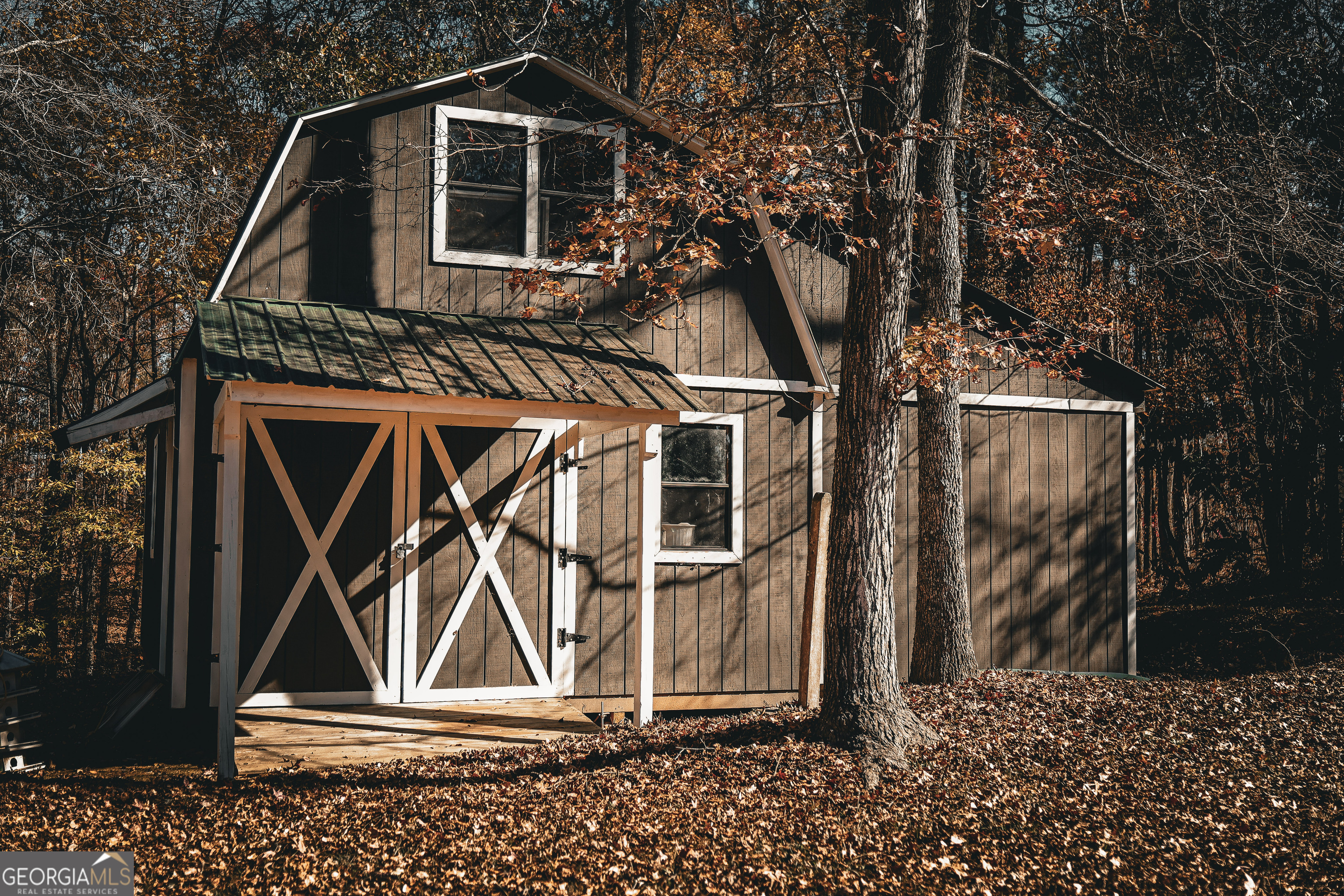 814 Oak Grove Church Road Musella, GA 31066 - Photo 16 of 55 a front view of a house with garden