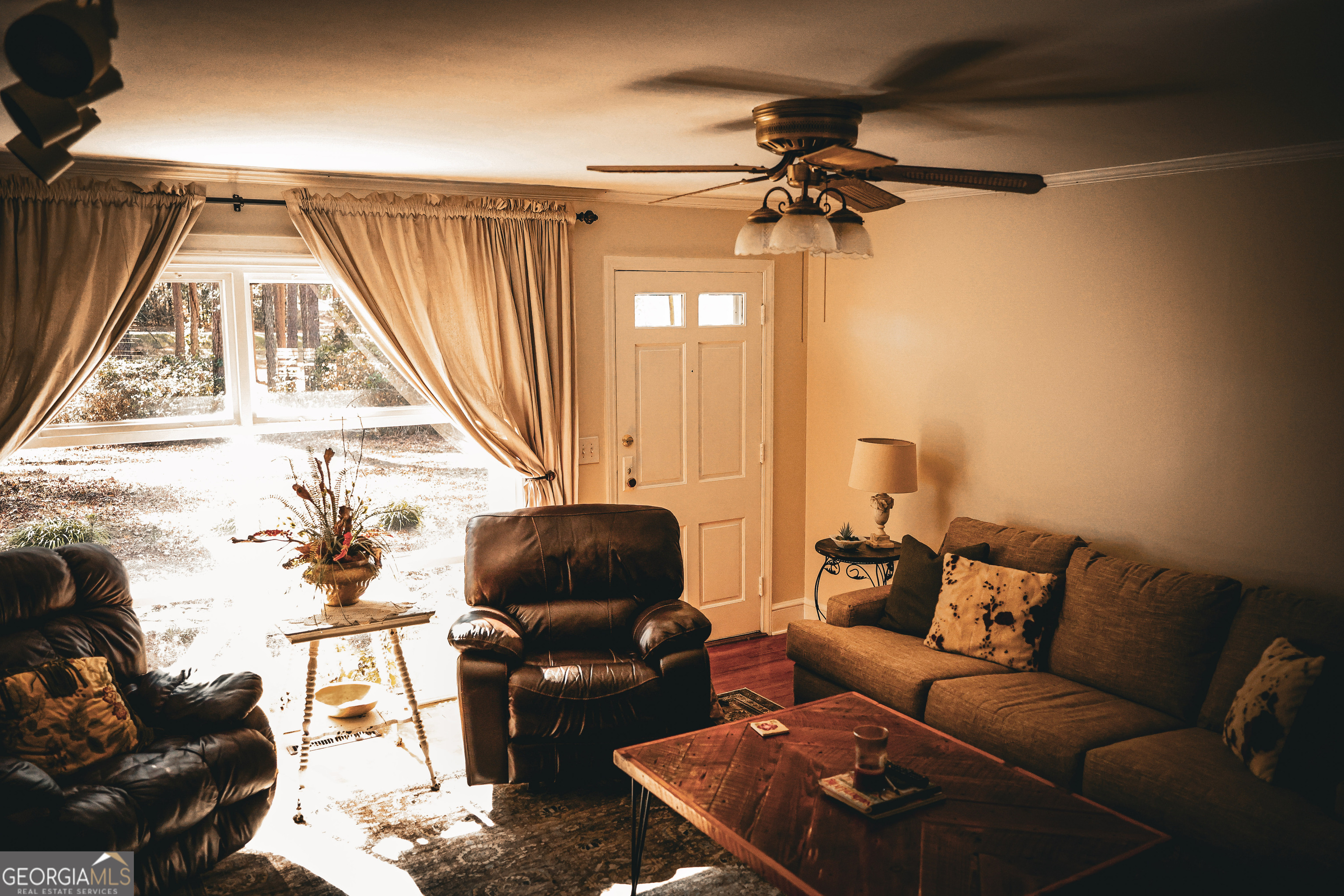 814 Oak Grove Church Road Musella, GA 31066 - Photo 29 of 55 a living room with furniture and a window