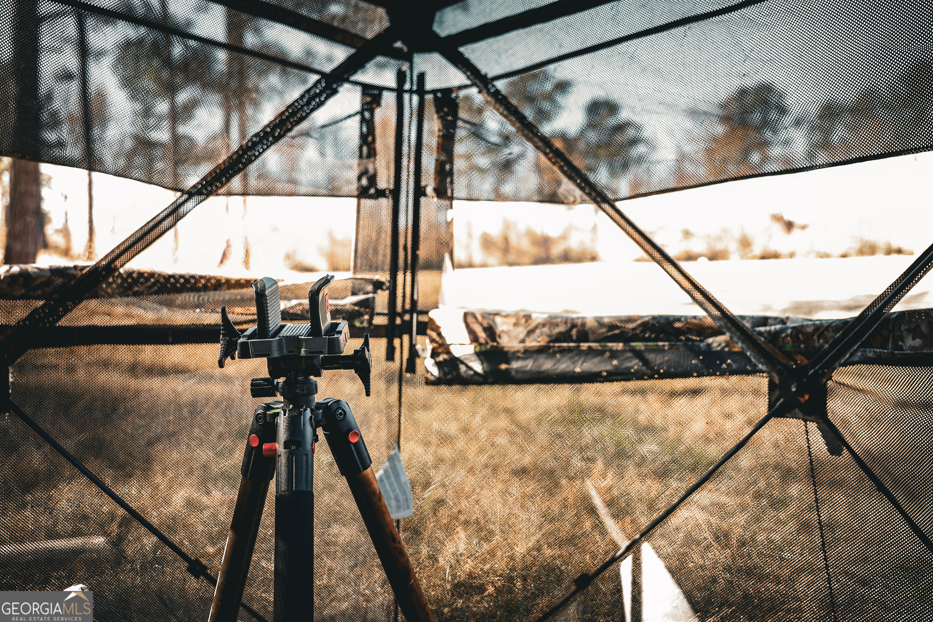 814 Oak Grove Church Road Musella, GA 31066 - Photo 33 of 55 a dining room with a glass top table and chairs