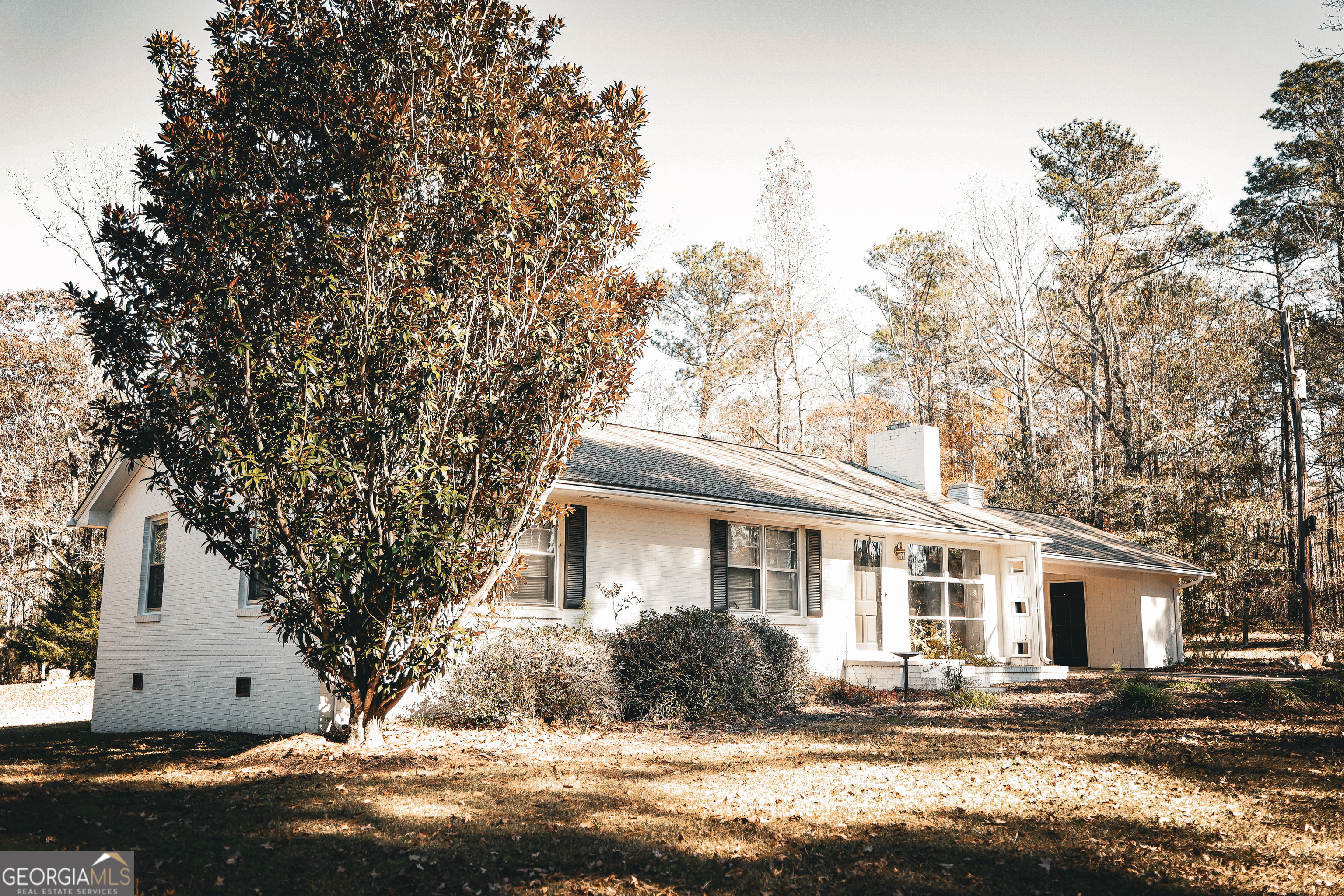 814 Oak Grove Church Road Musella, GA 31066 - Photo 34 of 55 a front view of a house with a yard