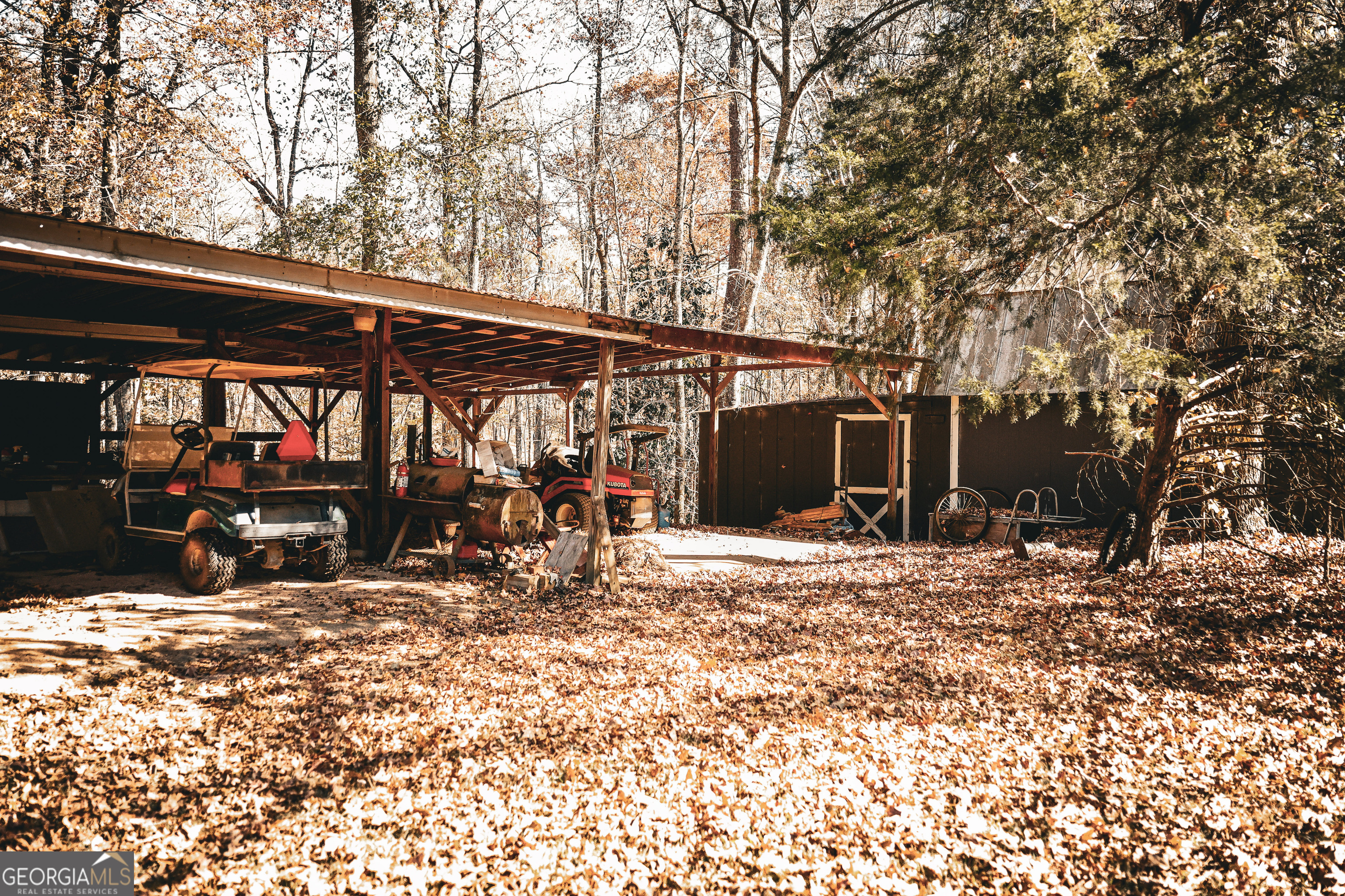 814 Oak Grove Church Road Musella, GA 31066 - Photo 7 of 55 a view of a car park in front of house