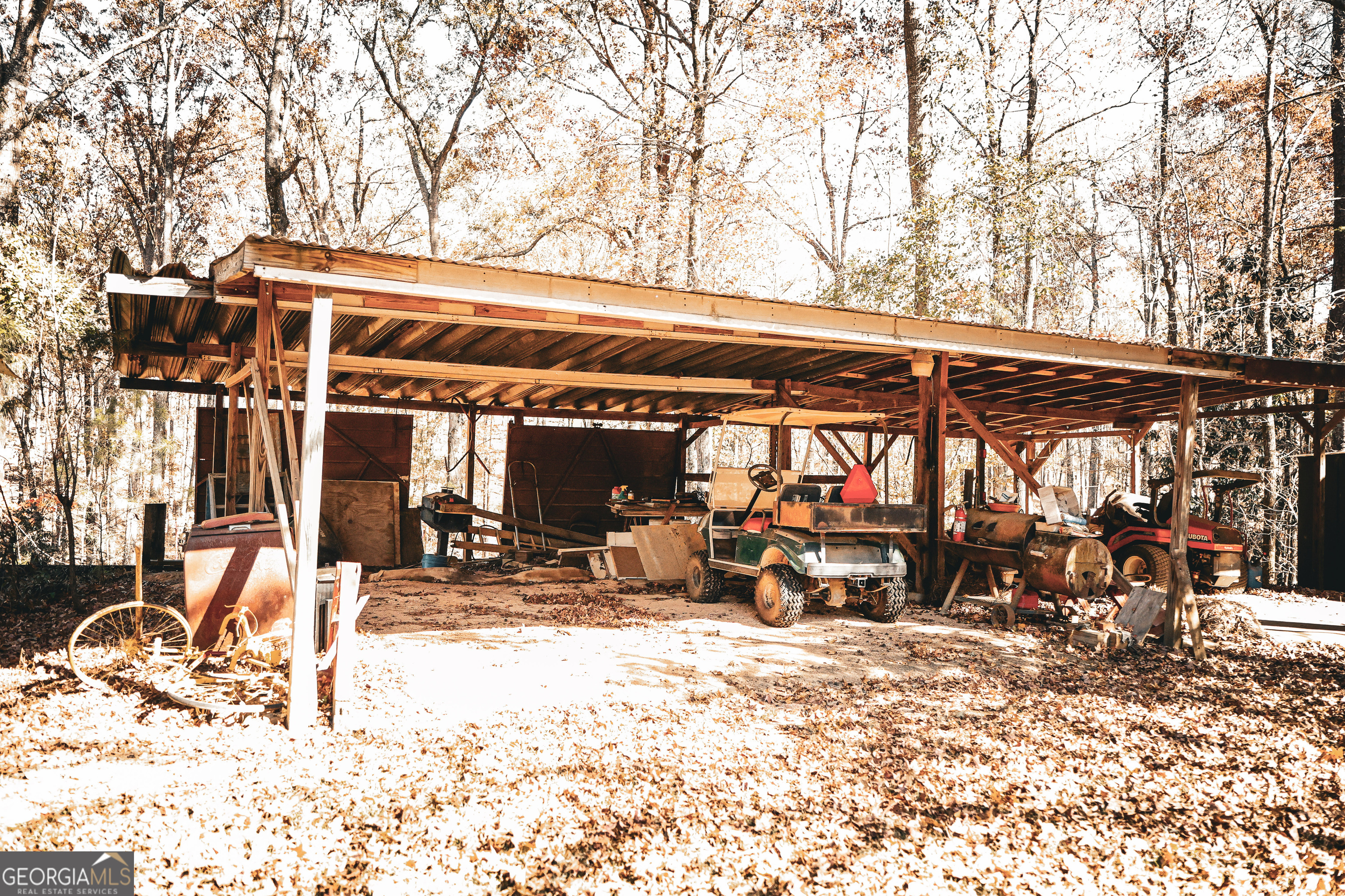 814 Oak Grove Church Road Musella, GA 31066 - Photo 10 of 55 a view of a chairs and table in the backyard
