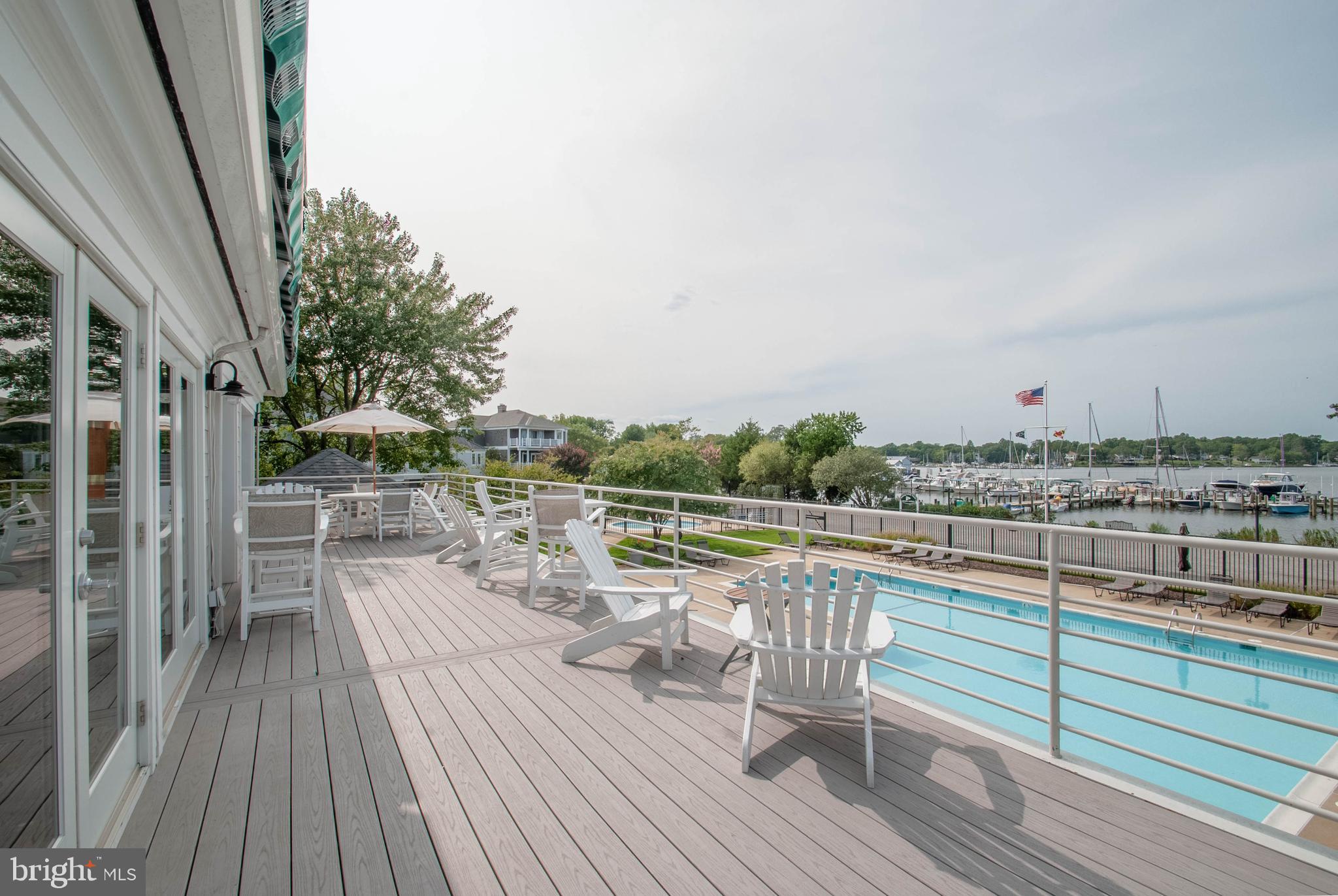 3672 Thomas Point Road Annapolis, MD 21403 - Photo 54 of 57 clubhouse deck overlooking pool
