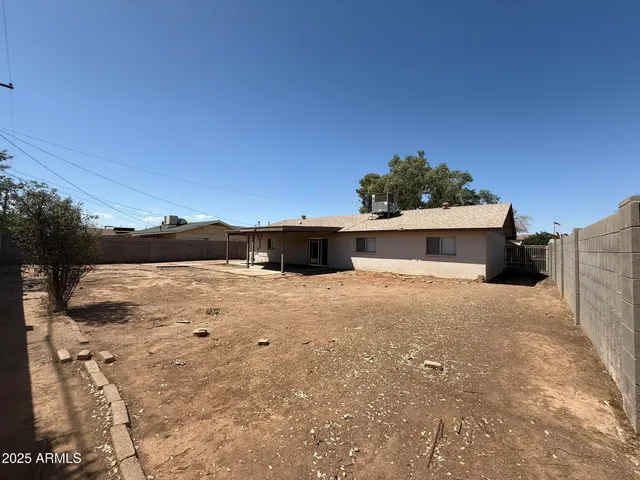 a view of a livingroom from a hallway