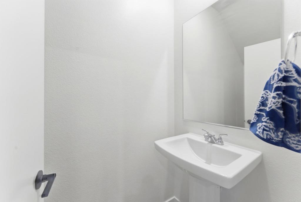 35172 Rangpur Lane Fallbrook, CA 92028 - Photo 15 of 47 a bathroom with a sink and a mirror