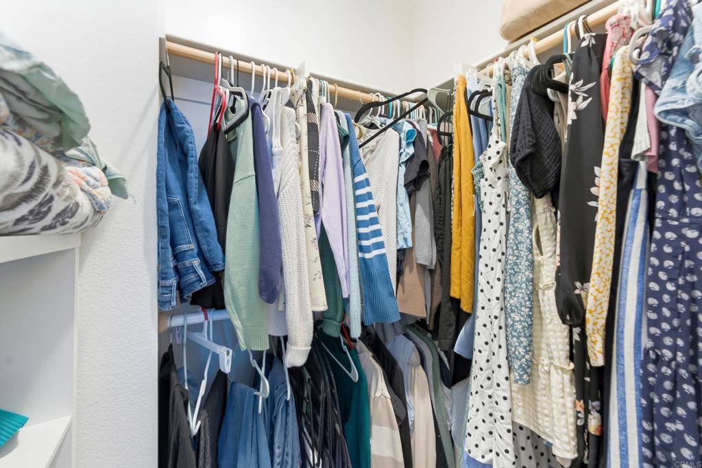 35172 Rangpur Lane Fallbrook, CA 92028 - Photo 31 of 47 a view of walk in closet with clothes