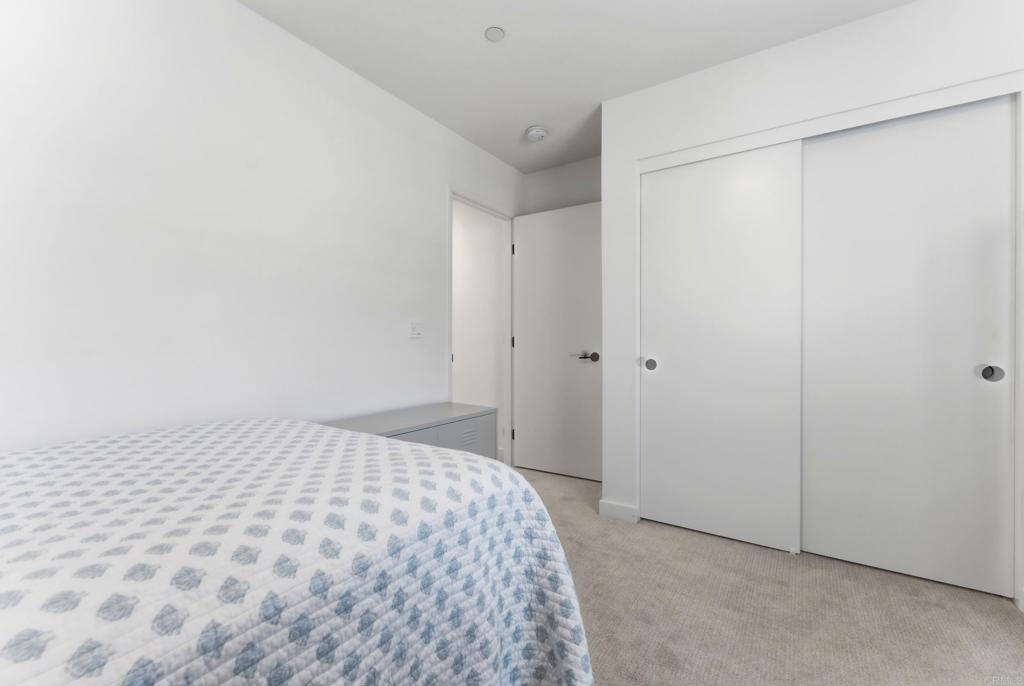35172 Rangpur Lane Fallbrook, CA 92028 - Photo 34 of 47 a bedroom with a bed and a shower