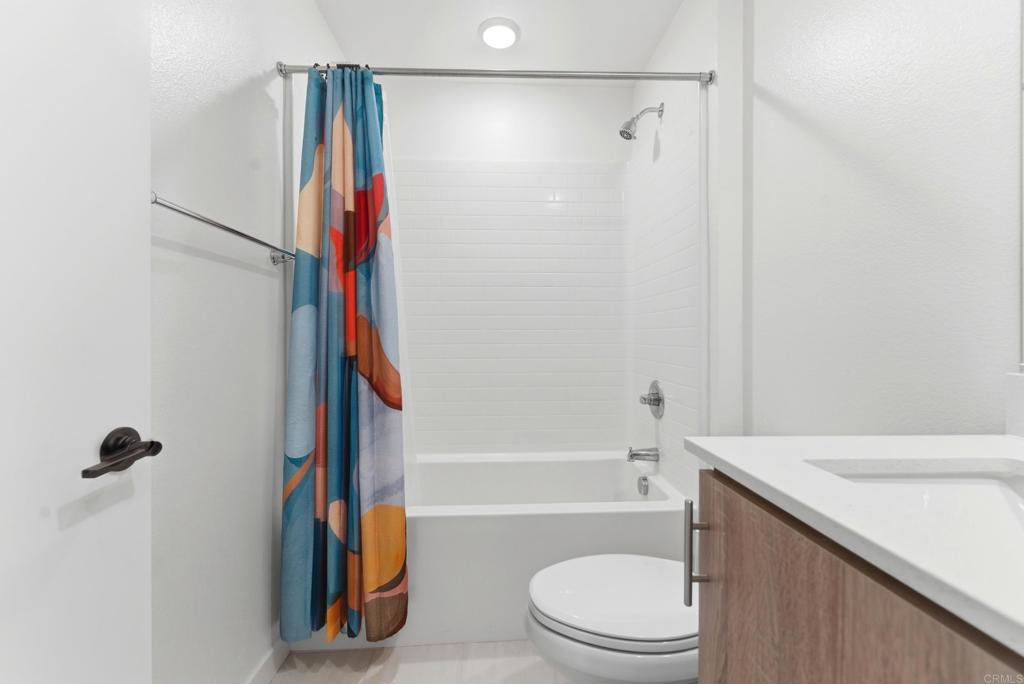 35172 Rangpur Lane Fallbrook, CA 92028 - Photo 35 of 47 a bathroom with a sink a toilet and a shower