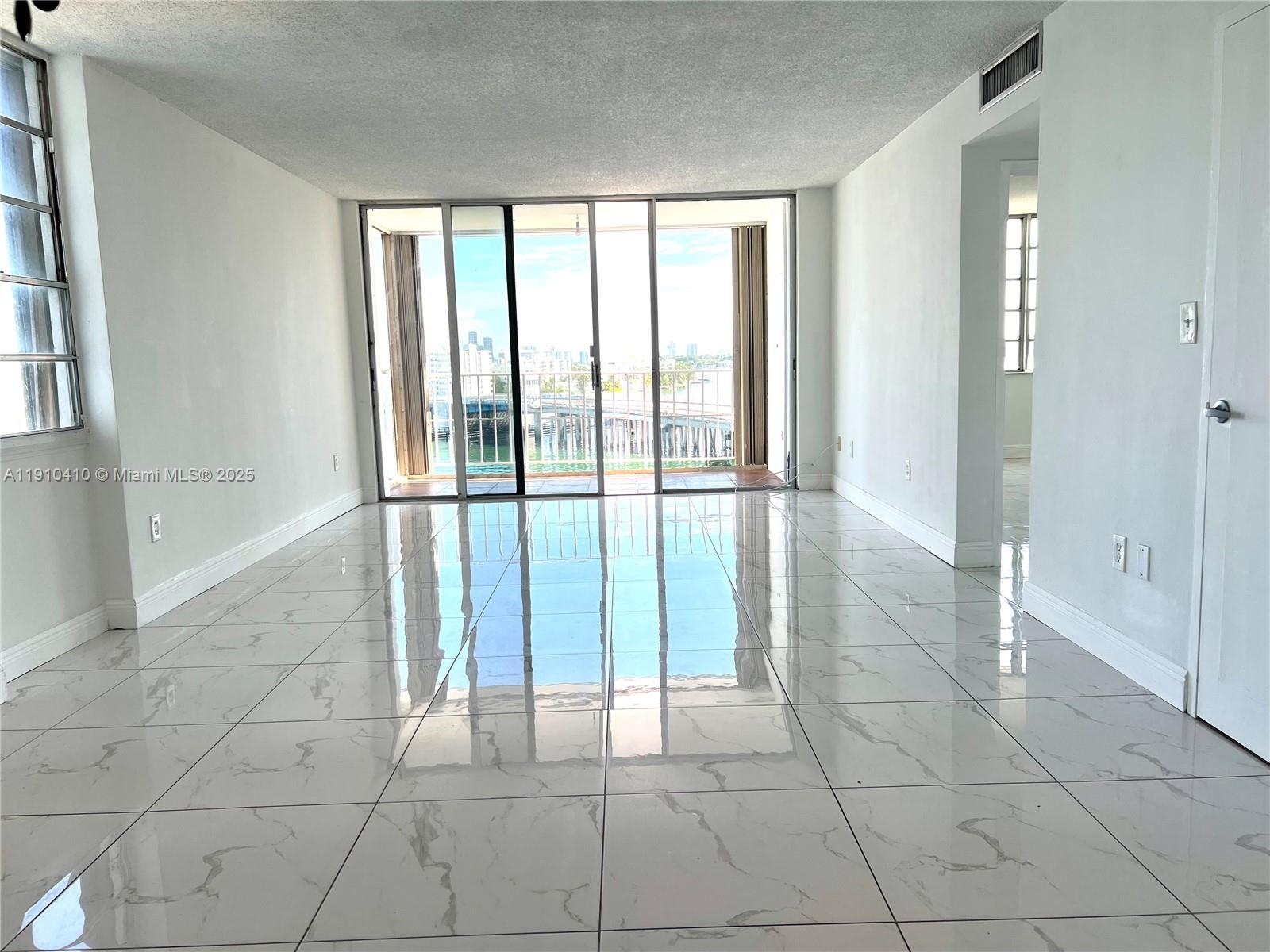1865 79th Street Causeway, Unit 7I North Bay Village, FL 33141 - Photo 11 of 40 a view of an empty room and window