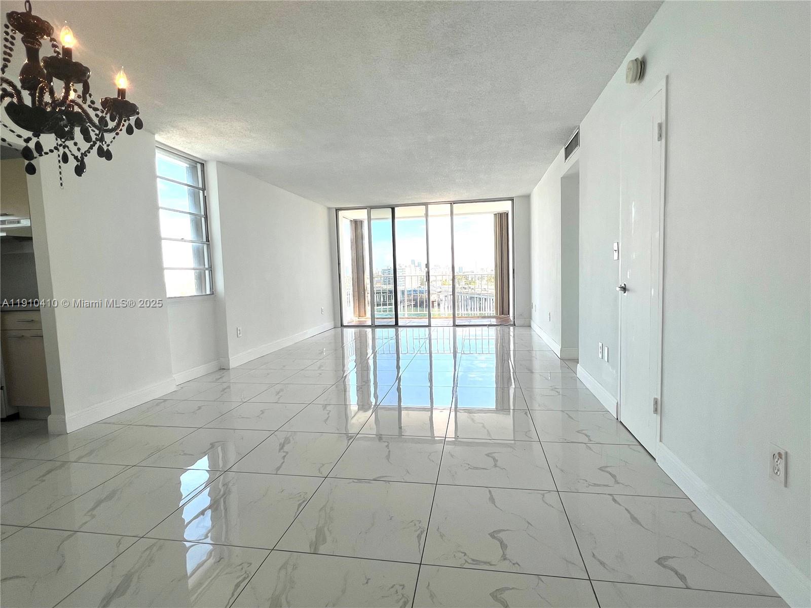 1865 79th Street Causeway, Unit 7I North Bay Village, FL 33141 - Photo 12 of 40 a view of an empty room with a window