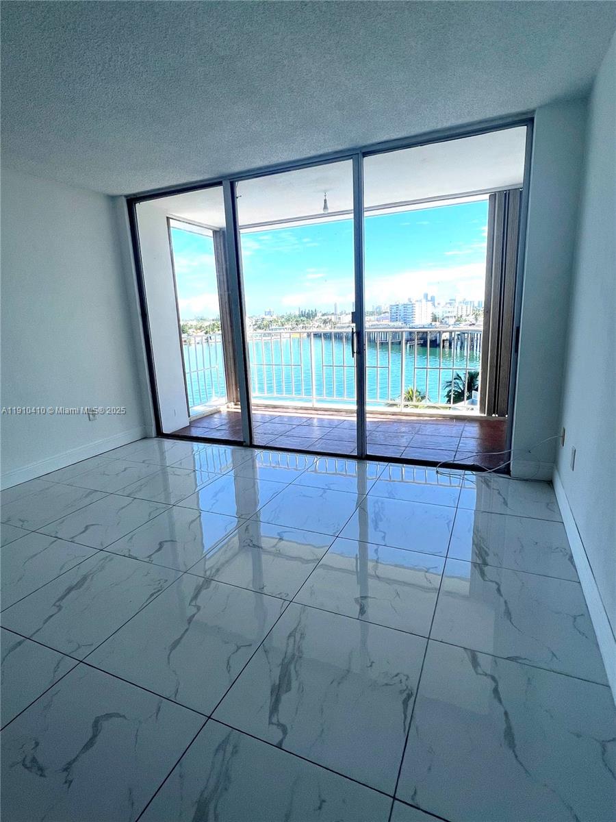 1865 79th Street Causeway, Unit 7I North Bay Village, FL 33141 - Photo 15 of 40 a view of an empty room and window