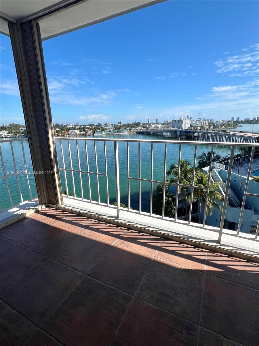 1865 79th Street Causeway, Unit 7I North Bay Village, FL 33141 - Photo 19 of 40 a view of a balcony with an outdoor space
