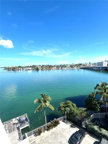 a view of a balcony with lake view and mountain view