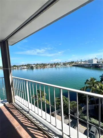 a view of a balcony with an outdoor space