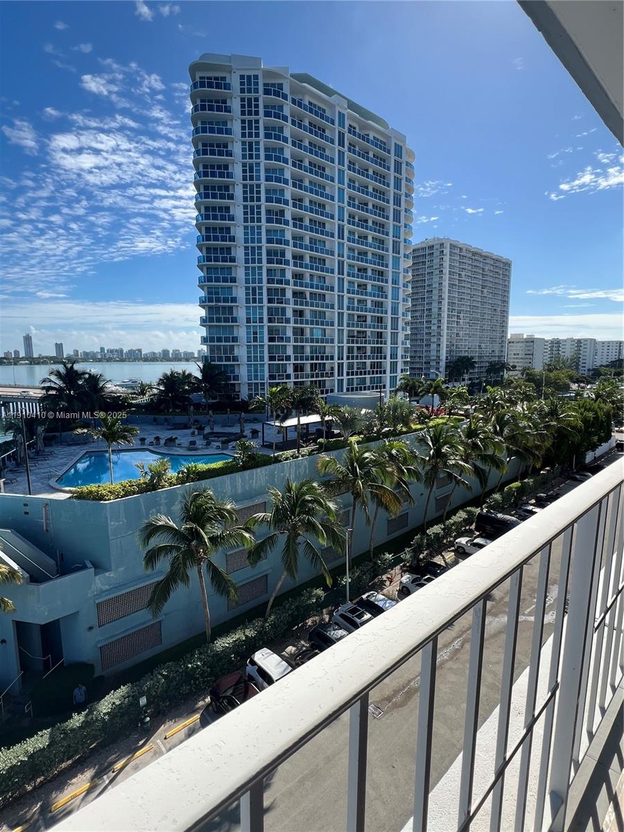 1865 79th Street Causeway, Unit 7I North Bay Village, FL 33141 - Photo 27 of 40 a view of a balcony with an outdoor space