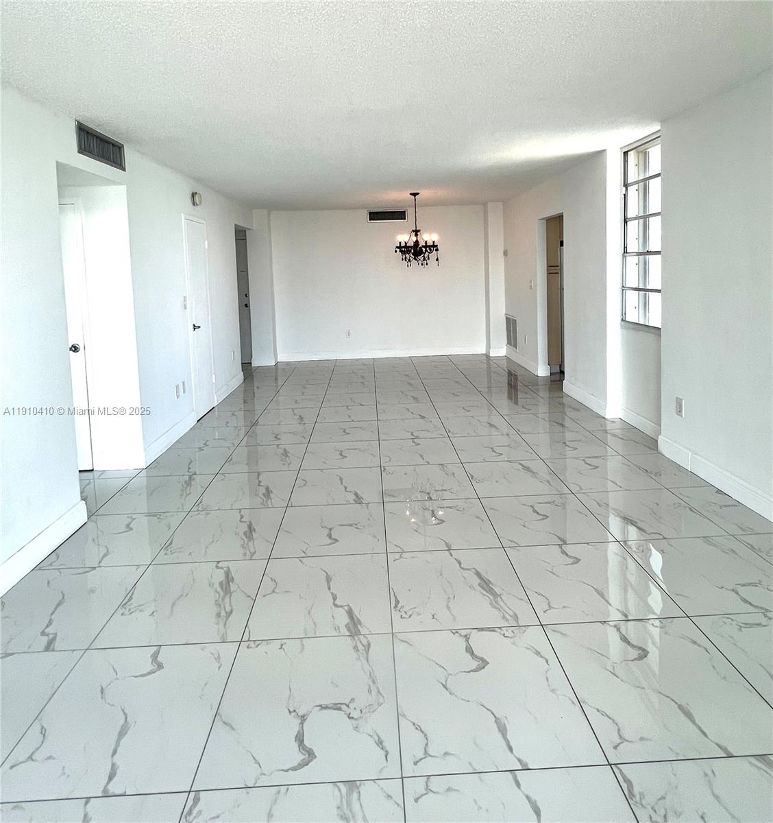 1865 79th Street Causeway, Unit 7I North Bay Village, FL 33141 - Photo 28 of 40 a view of empty room with white walls