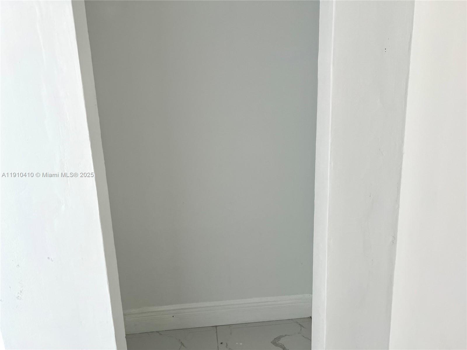 1865 79th Street Causeway, Unit 7I North Bay Village, FL 33141 - Photo 33 of 40 close up of a white marble wall