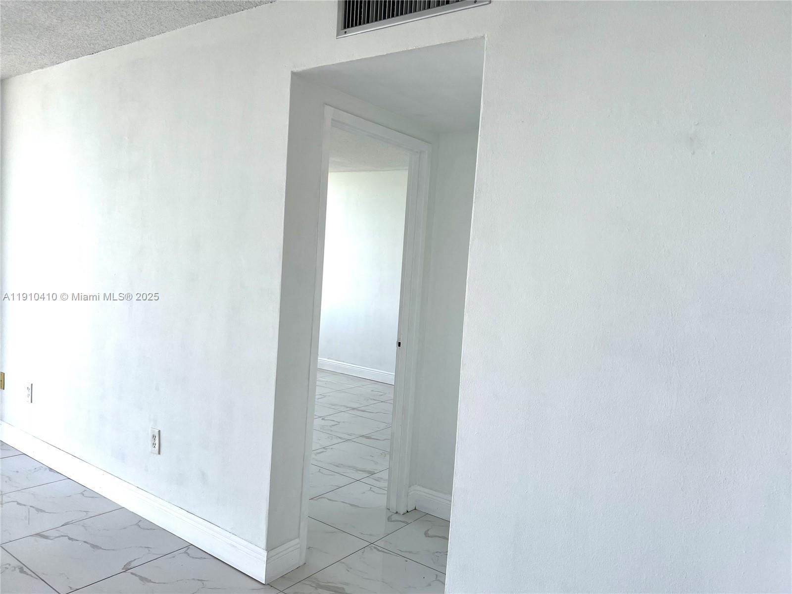 1865 79th Street Causeway, Unit 7I North Bay Village, FL 33141 - Photo 36 of 40 a bathroom with a bathtub