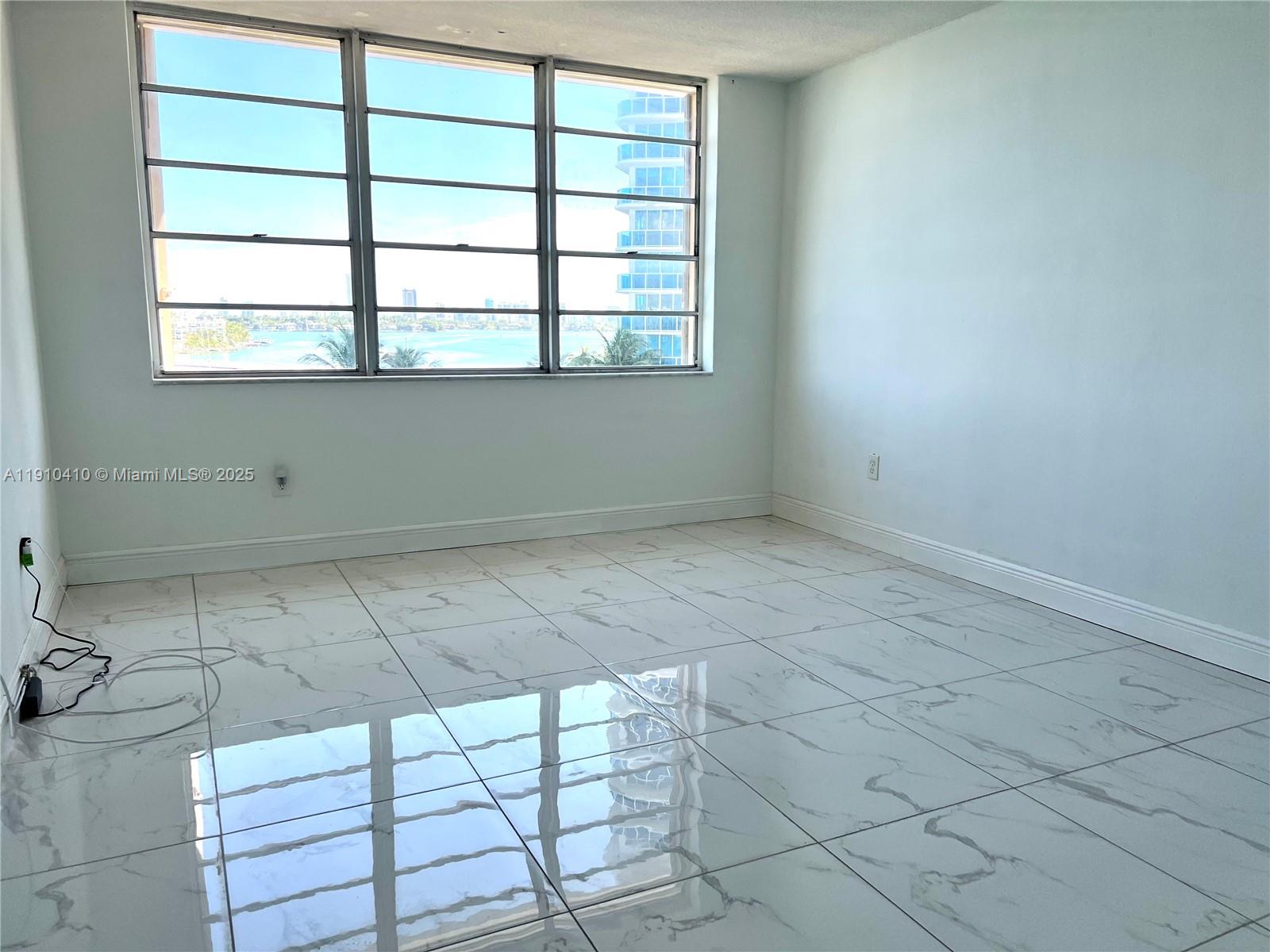 1865 79th Street Causeway, Unit 7I North Bay Village, FL 33141 - Photo 37 of 40 an empty room with windows