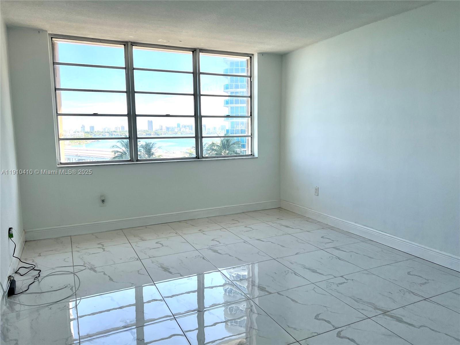 1865 79th Street Causeway, Unit 7I North Bay Village, FL 33141 - Photo 38 of 40 an empty room with windows