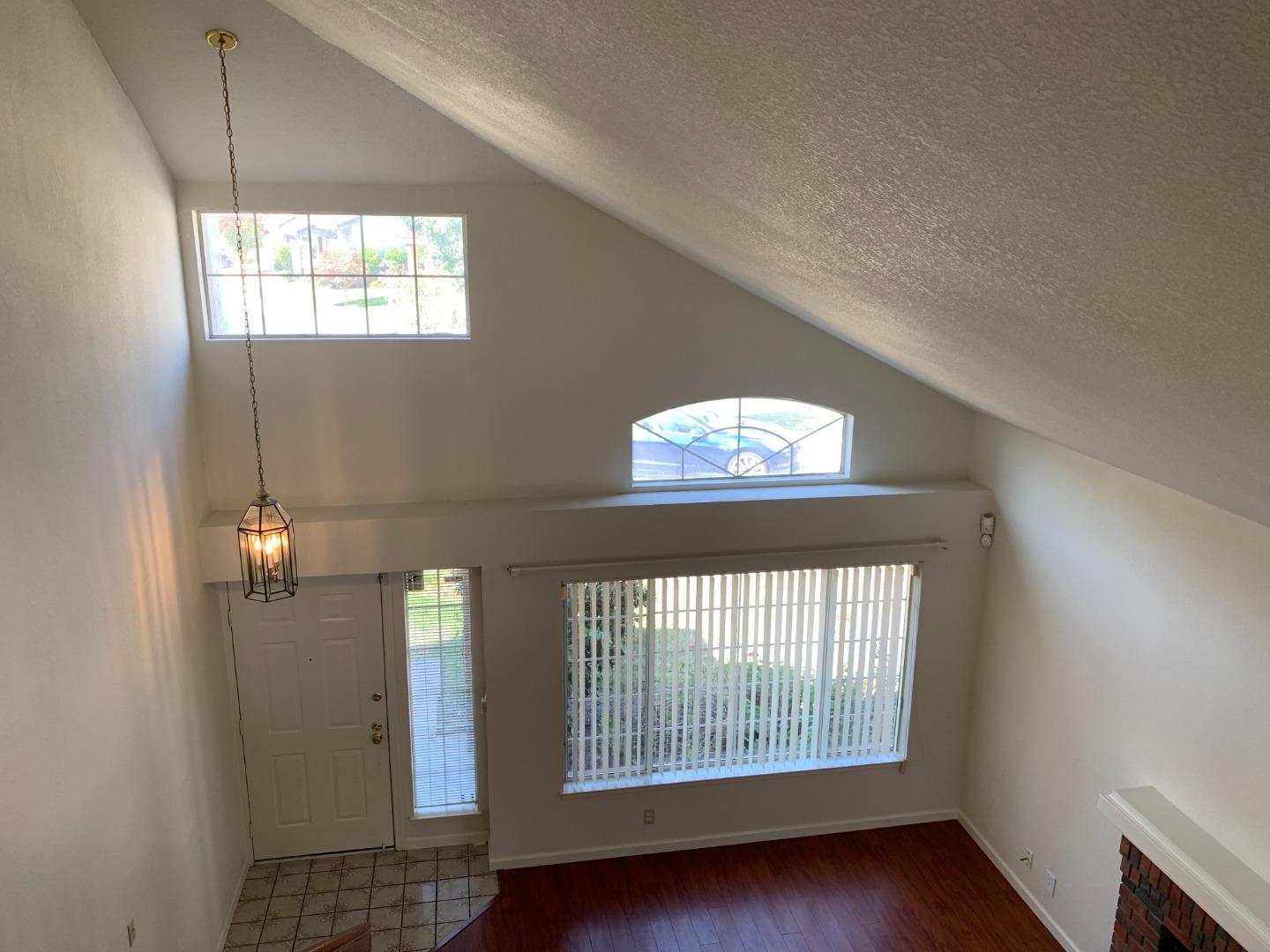 562 Costigan Circle Milpitas, CA 95035 - Photo 3 of 25 a view of an empty room with a window