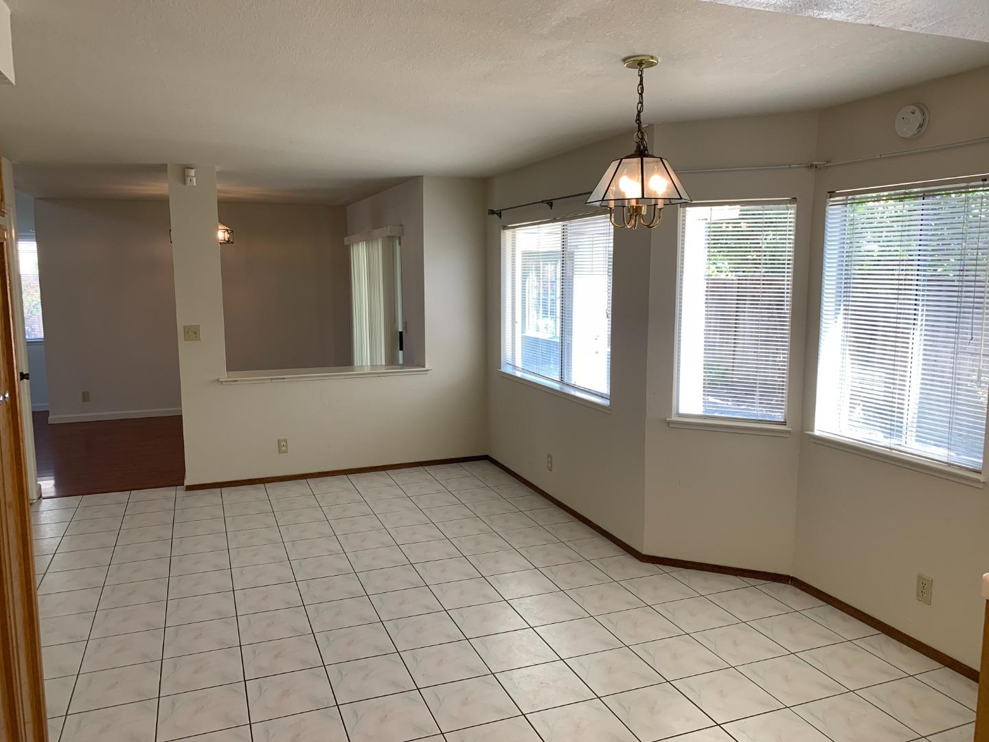 562 Costigan Circle Milpitas, CA 95035 - Photo 9 of 25 a view of an empty room with a window