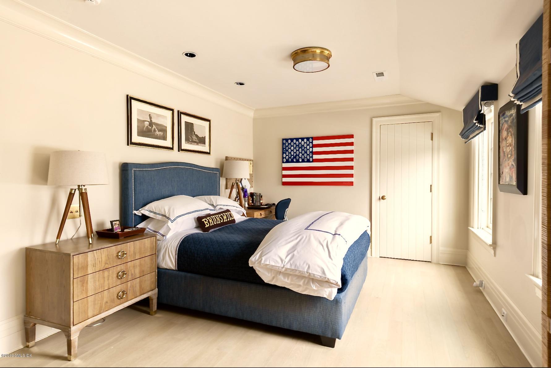 4 Cedar Hill Greenwich, CT 06830 - Photo 11 of 28 a bedroom with furniture and a bed