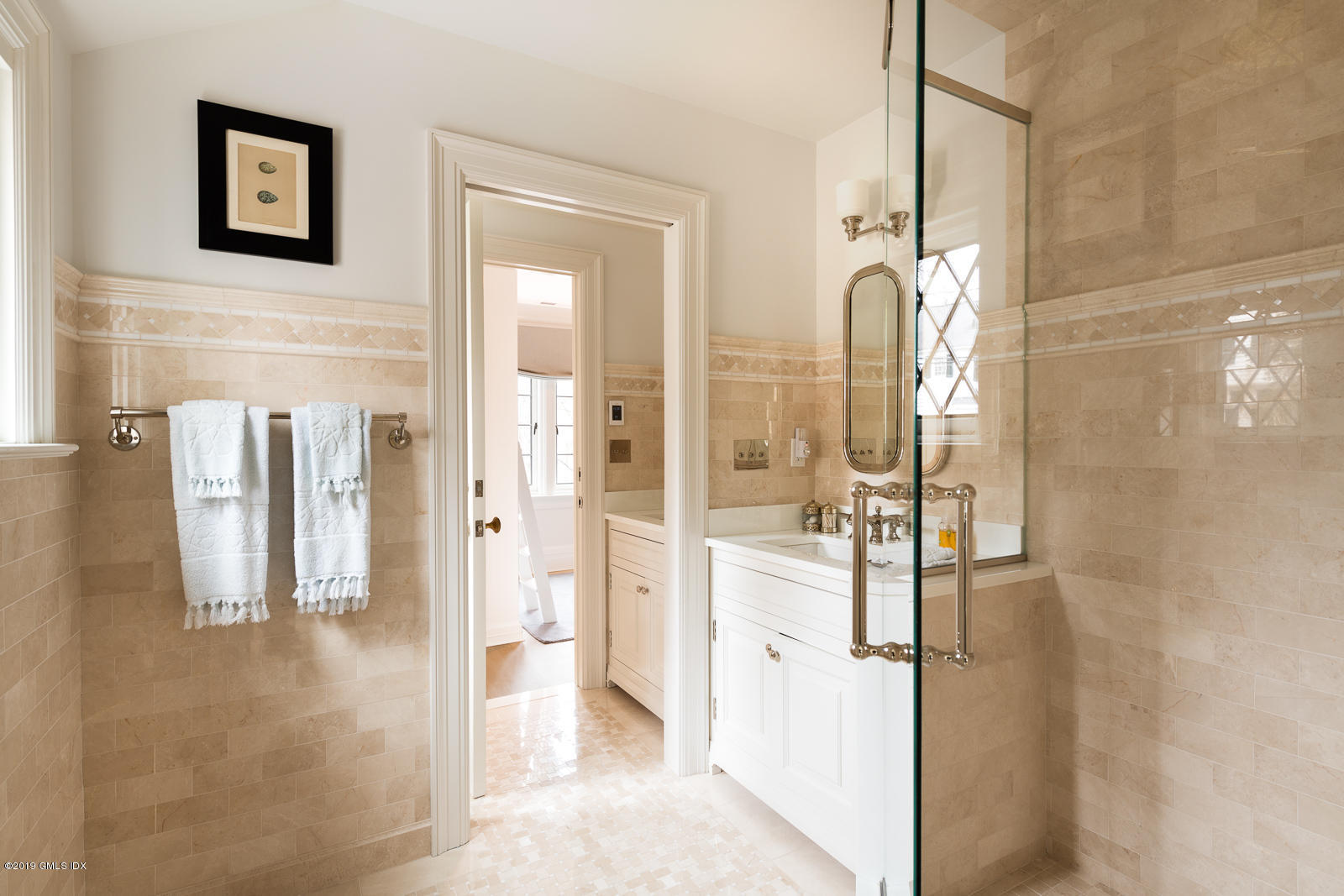 4 Cedar Hill Greenwich, CT 06830 - Photo 13 of 28 a bathroom with a glass shower door and a mirror