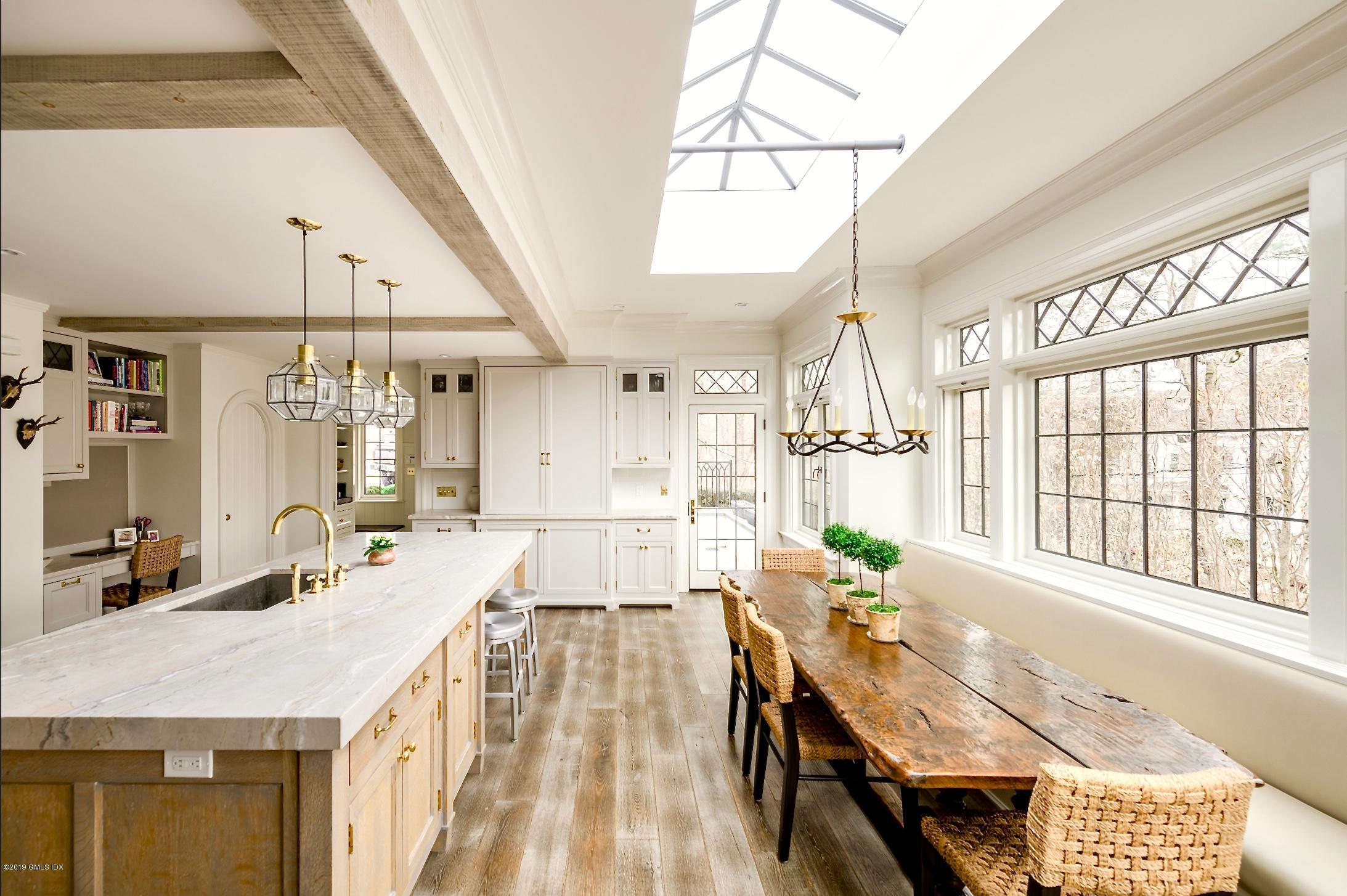 4 Cedar Hill Greenwich, CT 06830 - Photo 4 of 28 a large living room with a large window